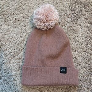 Skida Pom hat